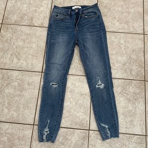 Light wash distress jeans